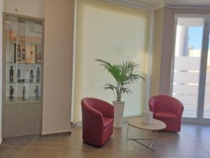 Posedenie v ubytovaní Travini Hotel Residence