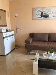 Ein Sitzbereich in der Unterkunft Apartments Sanja