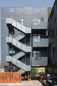 a staircase on the side of a building at Steel Residence in Timişoara
