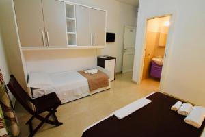 A bed or beds in a room at B&B Pietramare