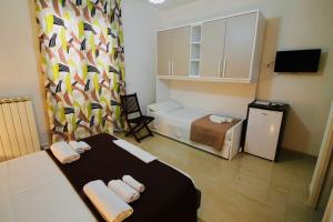 A bed or beds in a room at B&B Pietramare