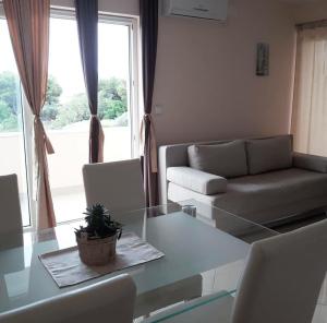 Ein Sitzbereich in der Unterkunft Apartments Sanja