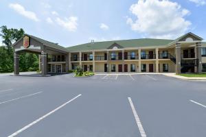 an empty parking lot in front of a hotel at Super 8 by Wyndham Petersburg in Petersburg