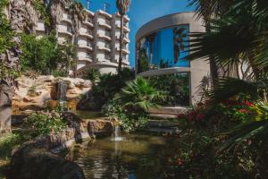 Сад в Ostella Spa & Resort