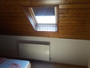Posteľ alebo postele v izbe v ubytovaní Major apartman