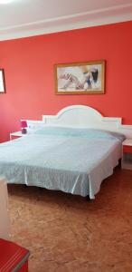 A bed or beds in a room at Vivienda Perez Martin