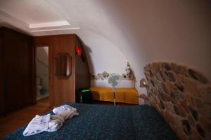 Katil atau katil-katil dalam bilik di Il Cigno B&B