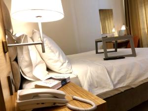 Postel nebo postele na pokoji v ubytování Hotel Fehmi Bey - Special Category