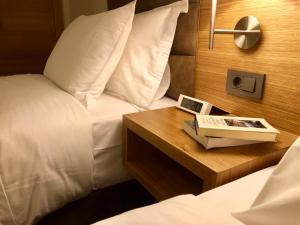 Postel nebo postele na pokoji v ubytování Hotel Fehmi Bey - Special Category
