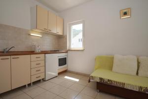Kuchyňa alebo kuchynka v ubytovaní Vita Apartments