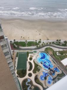 - une vue aérienne sur un complexe près de la plage dans l'établissement Ap pé na areia frente praia Costa do sol, à Praia Grande