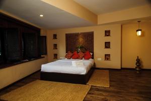 Letto o letti in una camera di Thagu Chhen, a Boutique Hotel