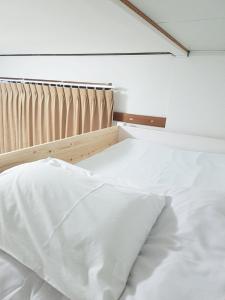 Postel nebo postele na pokoji v ubytování M's Kanazawa