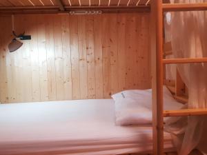 Postel nebo postele na pokoji v ubytování Checheng Backpackers Hostel