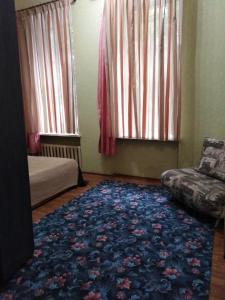 En eller flere senge i et værelse på Welcome Apartments in Odessa