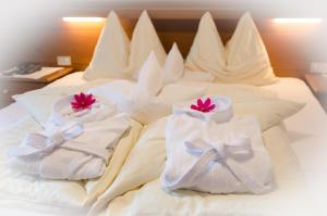 Ένα ή περισσότερα κρεβάτια σε δωμάτιο στο Pension Felseneck +19 φωτογραφίες