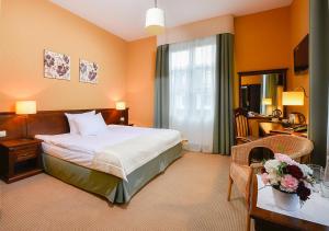 Łóżko lub łóżka w pokoju w obiekcie Hotel Nowodwory