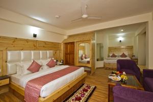 Postelja oz. postelje v sobi nastanitve Hotel Hayer Regency