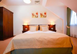 Łóżko lub łóżka w pokoju w obiekcie Hotel Nowodwory