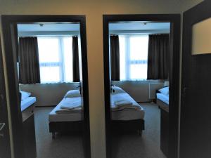 Posteľ alebo postele v izbe v ubytovaní Hotel Cargo
