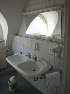 Ein Badezimmer in der Unterkunft Avenue Hotel