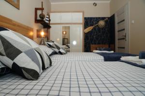 Tempat tidur dalam kamar di Blue Grey Atelier