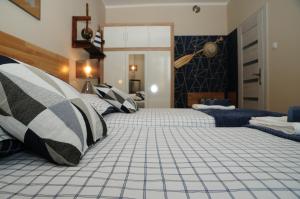 Posteľ alebo postele v izbe v ubytovaní Blue Grey Atelier
