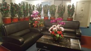 Area soggiorno di Chian Huei Business Hotel