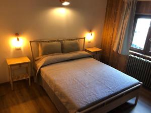 Postel nebo postele na pokoji v ubytování B&B Chalet