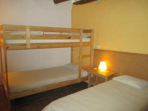 Katil atau katil-katil dalam bilik di Can Corretjola