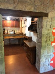 Kuchyň nebo kuchyňský kout v ubytování B&B Chalet