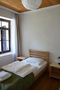 سرير أو أسرّة في غرفة في Guesthouse Mountain View