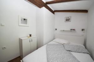 Postel nebo postele na pokoji v ubytování Holiday Home Cosseriga
