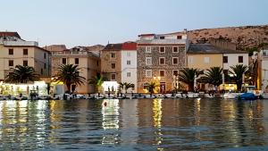 a view of a city from the water at Salt & Stone Villa in Pag