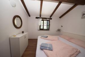 Postel nebo postele na pokoji v ubytování Holiday Home Cosseriga