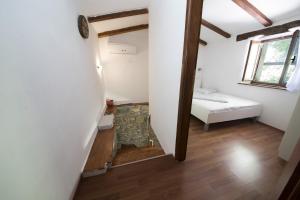Postel nebo postele na pokoji v ubytování Holiday Home Cosseriga