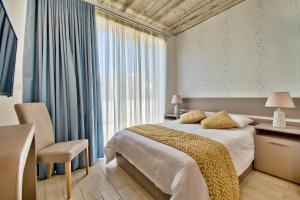 Postel nebo postele na pokoji v ubytování Cozy Rooms Hotel