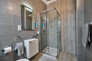 Koupelna v ubytování Cozy Rooms Hotel
