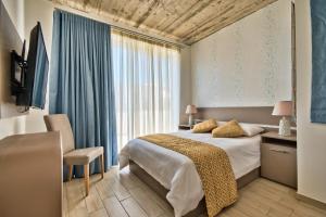 Postel nebo postele na pokoji v ubytování Cozy Rooms Hotel