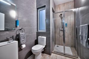 Koupelna v ubytování Cozy Rooms Hotel