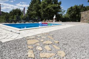 Bazén v ubytování Holiday Home Cosseriga nebo v jeho okolí