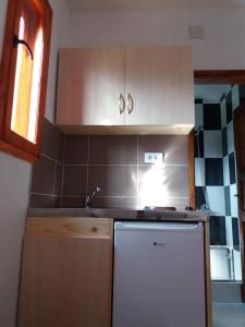 Kuchyň nebo kuchyňský kout v ubytování Guest House Vukicevic