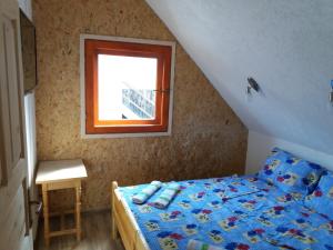 Postel nebo postele na pokoji v ubytování Guest House Vukicevic