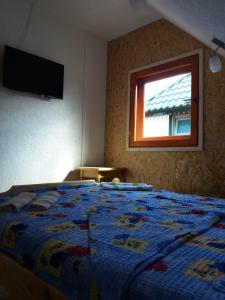 Postel nebo postele na pokoji v ubytování Guest House Vukicevic