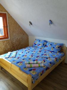 Postel nebo postele na pokoji v ubytování Guest House Vukicevic