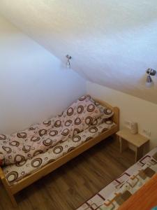 Postel nebo postele na pokoji v ubytování Guest House Vukicevic