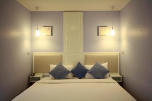 Postel nebo postele na pokoji v ubytování Hotel Alley