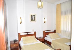 Postel nebo postele na pokoji v ubytování Hotel Bleta