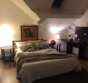 Postel nebo postele na pokoji v ubytování Rhotels