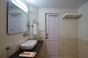 Kopalnica v nastanitvi Hotel Hayer Regency